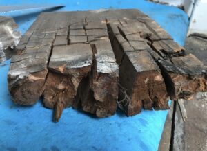 Rotten timber damaged by damp in a North East England home, showing wood decay caused by wet rot or poor ventilation